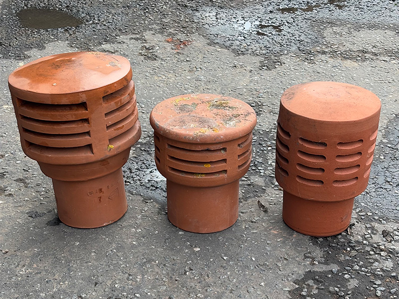 Reclaimed clay chimney cowls with traditional vented design