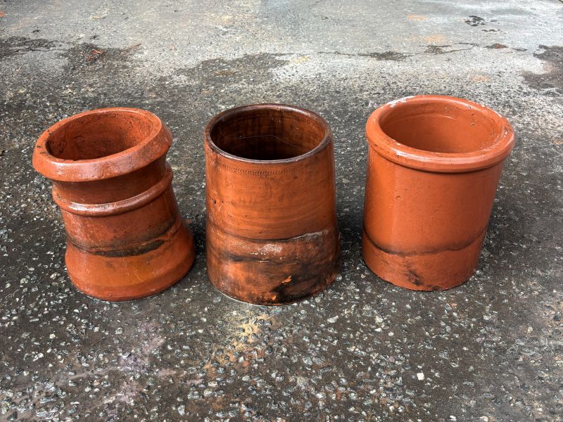 Reclaimed terracotta chimney pots in various traditional shapes and designs