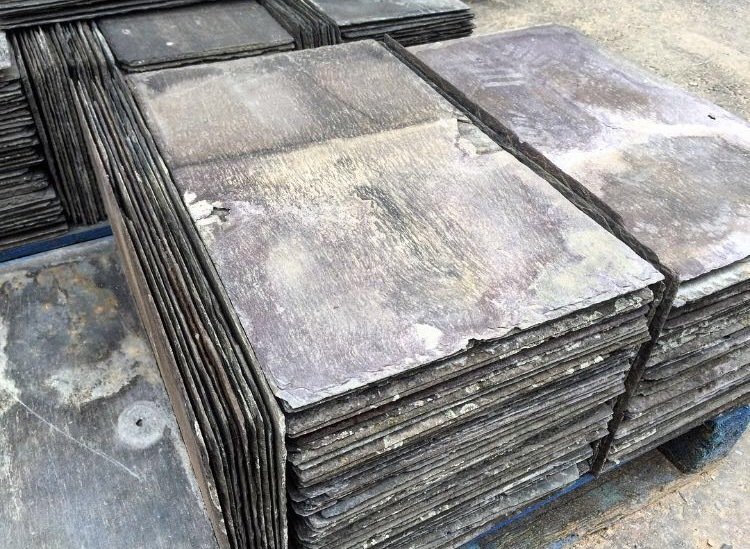 Welsh roofing slates with natural blue-grey tones and hand-split finish